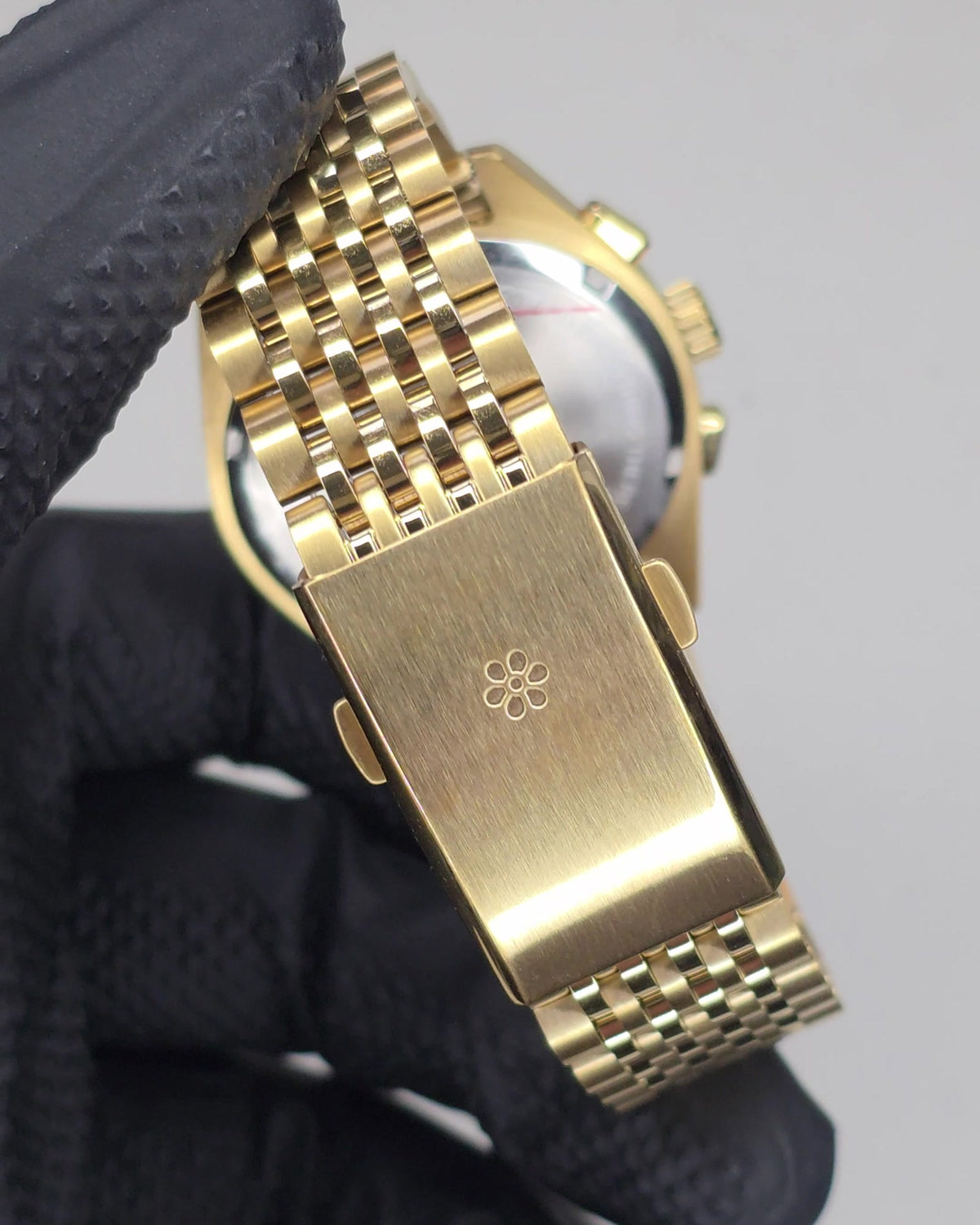 Season #2 Midnight Gold bracelet clasp engraved with the Season daisy